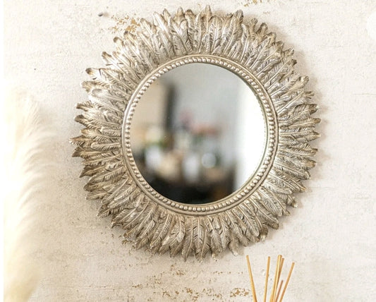 Feathered round mirror